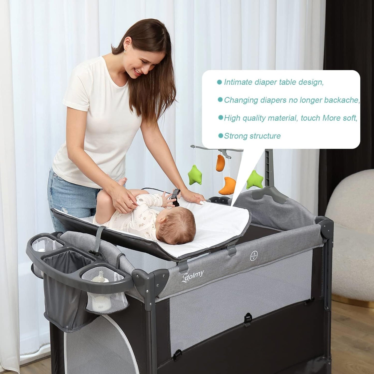 Zdolmy Baby Bedside Sleeper Bassinet, 4-in-1 Pack and Play with Bassinet w/Diaper Changing Table & Storage Bag, 3 Adjustable Heights, Toy Arch & Music, Portable Baby Play Yard with Carry Bag