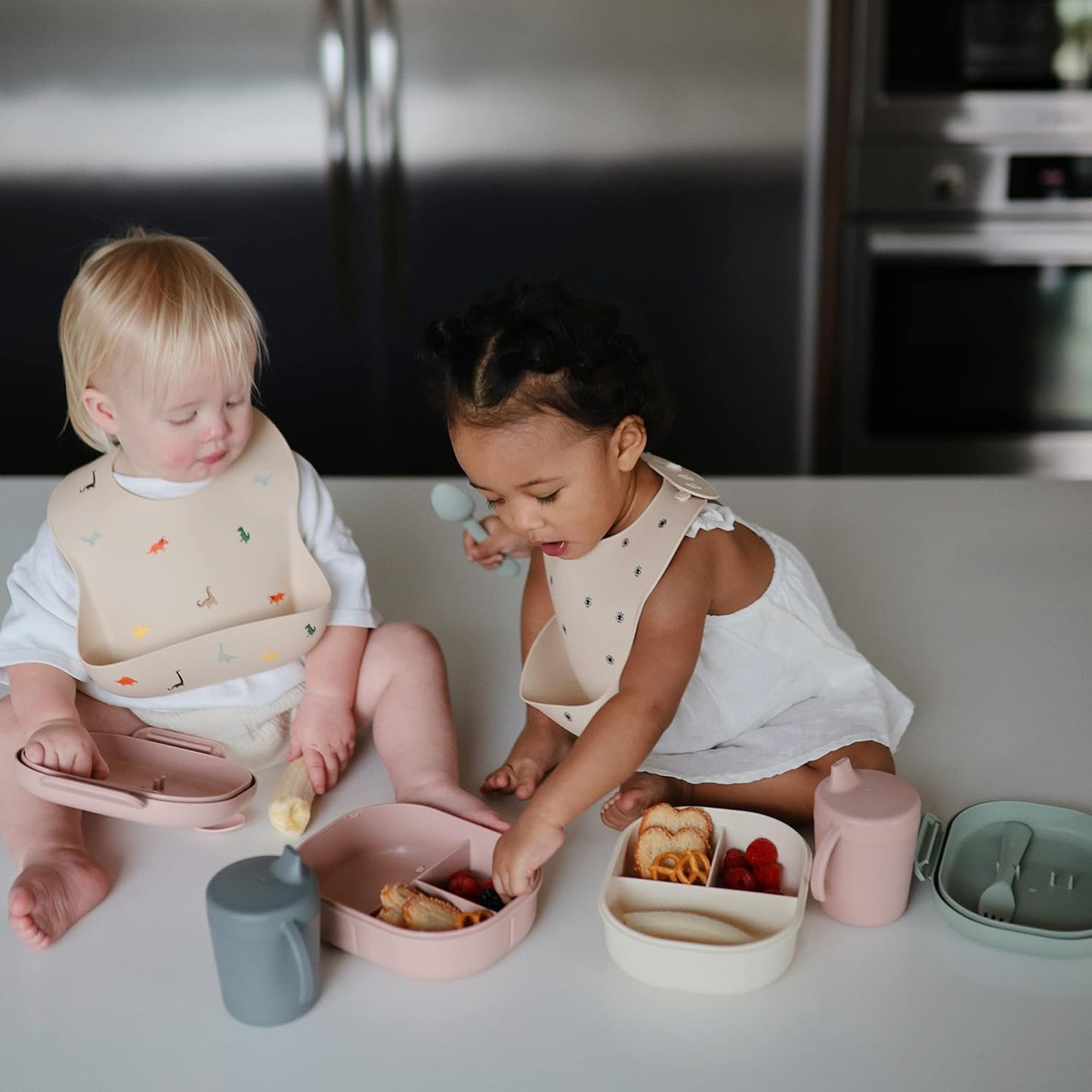 mushie Silicone Baby Bib | Adjustable Fit Waterproof Bibs (Cherries)