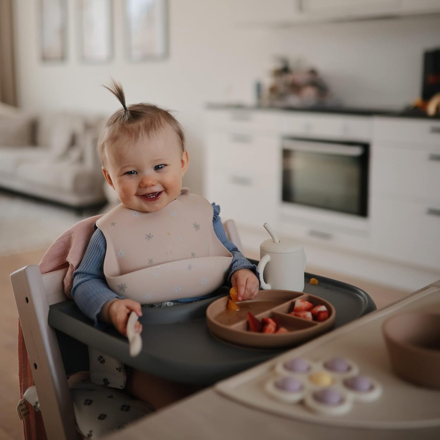mushie Silicone Baby Bib | Adjustable Fit Waterproof Bibs (Daisy)
