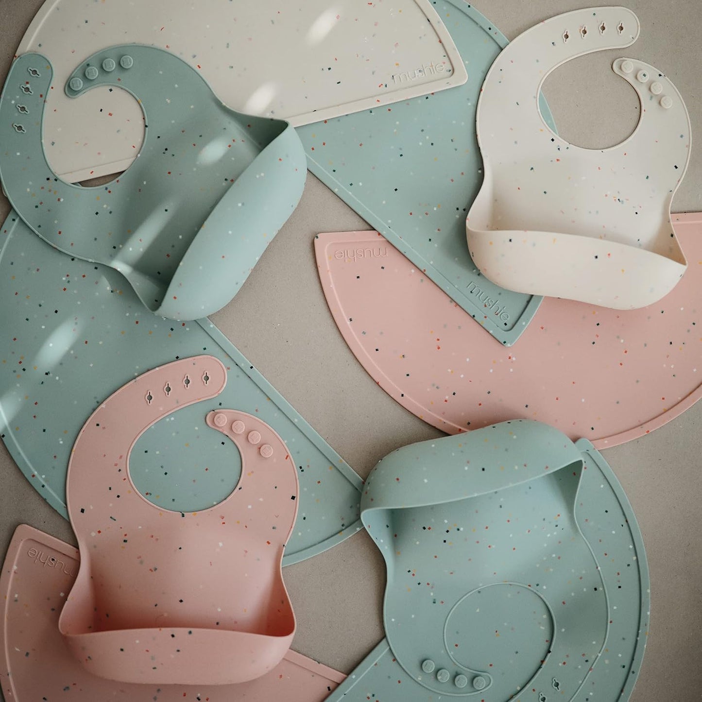 mushie Silicone Baby Bib | Adjustable Fit Waterproof Bibs (Cambridge Blue Confetti)